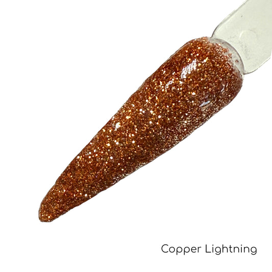 Orange glitter nail swatch